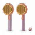 Two views of a handheld pumpkin pet comb with a round sponge head in peach and gold and a lavender handle are shown on a white background with a small inset of the brush head.