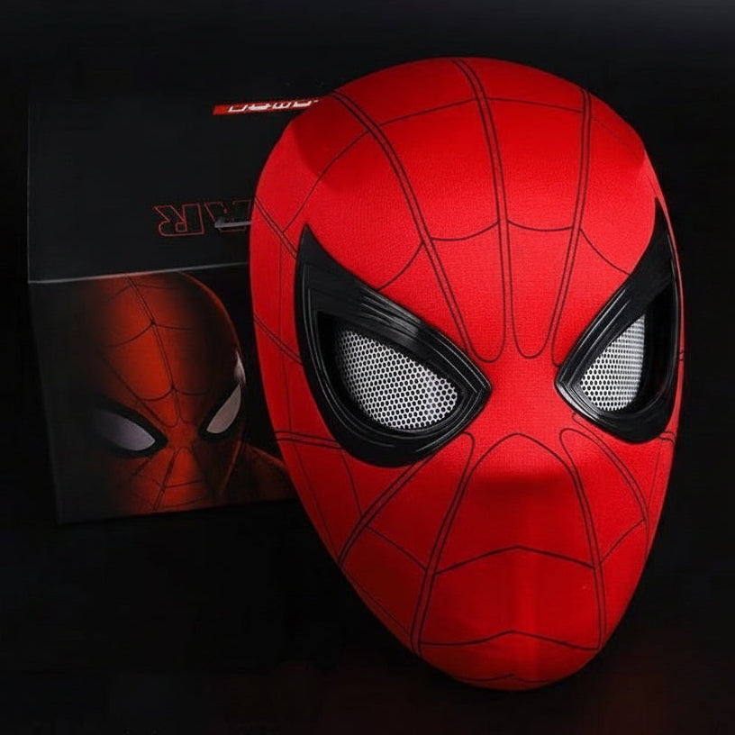 Red superhero mask with black web patterns on a dark background